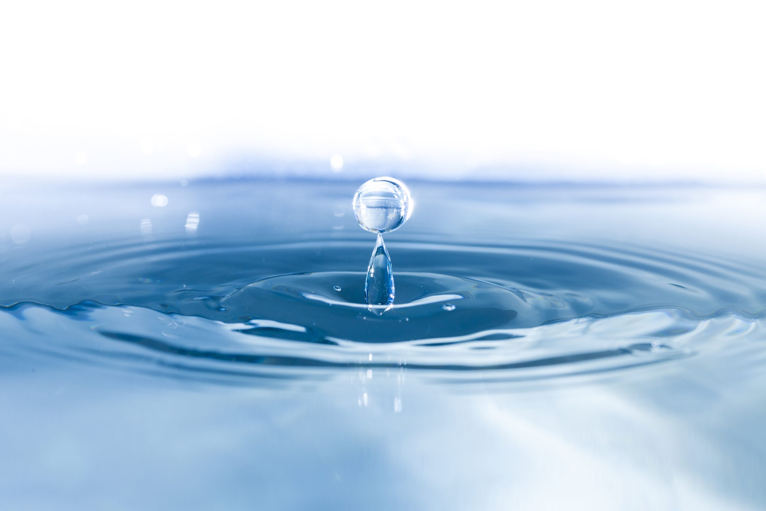 water-surface-with-ripples-drop-falling
